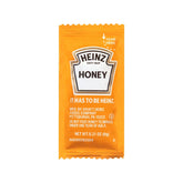Heinz Honey single-serve packet front view for quick, convenient sweetening.