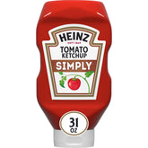 Heinz Simply Tomato Ketchup bottle pouring on burgers and fries for a classic flavor