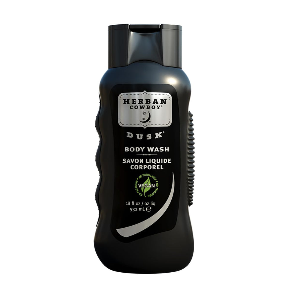 Herban Cowboy Dusk bottle label highlights cedar and sandalwood notes for daily use.