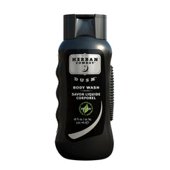 Herban Cowboy Dusk bottle label highlights cedar and sandalwood notes for daily use.