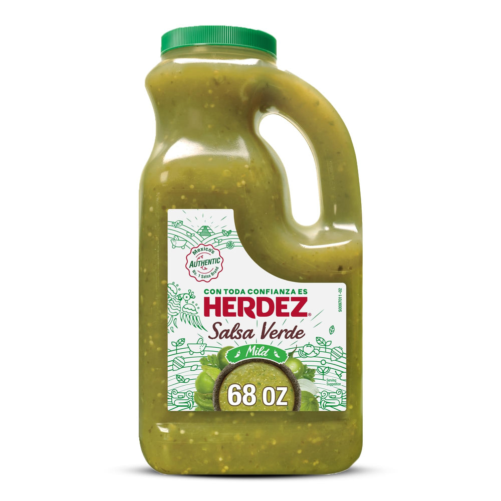 Herdez Salsa Verde Mild jug being poured for taco night with tangy tomatillo flavor.