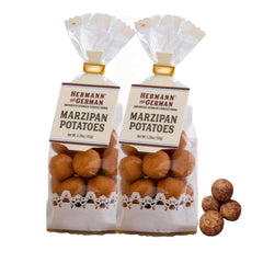 Hermann the German marzipan potatoes closeup-dusting highlights cocoa sparkle and soft bite.