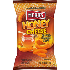 Herr's Honey Cheese Curls snack textures in a bowl invite snacking