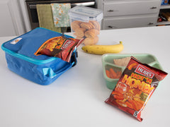 Multi-pack Herr's Hot & Honey Cheese Curls ready for sharing.