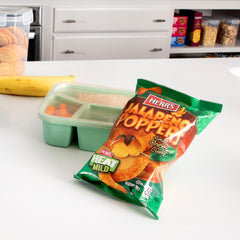 Oven-baked texture highlight on Herr's Cheese Curls for crisp bite