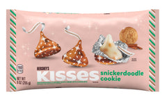 Hershey's Snickerdoodle Kisses white creme with cookie bits close-up, creamy texture with crunch.