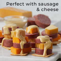 Hickory Farms Sweet Hot Mustard three-pack display highlighting value for entertaining