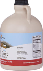 Hidden Springs Maple syrup on pancakes, inviting rich breakfast sweetness.