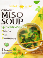Hikari Miso Organic Instant Miso Soup with spinach and wakame in a bowl.
