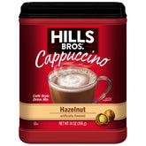 Hills Bros Cappuccino Hazelnut cup with steam delivers café-style comfort at home.