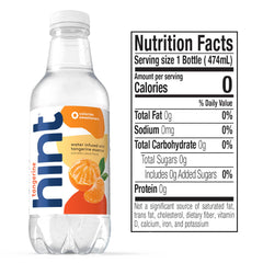 Hint Tangerine water being poured for zero-calorie flavor