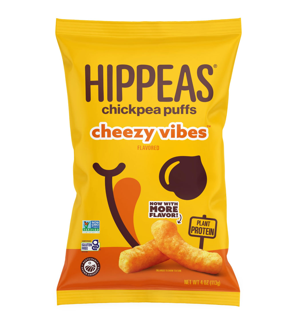 HIPPEAS Nacho Vibes puffs on a plate, a vegan gluten-free snack for anytime.