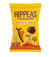 HIPPEAS Nacho Vibes puffs on a plate, a vegan gluten-free snack for anytime.
