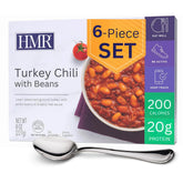HMR turkey chili with beans entree pack on counter, convenient shelf-stable lunch option