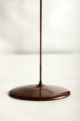 Hollander Chocolate Cafe Sauce ingredients label highlights GMO-free and vegan attributes