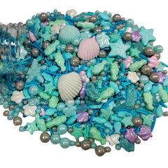 Homankit Ocean Sprinkles shells add beachy texture to cupcakes.