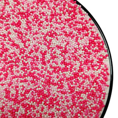 Homankit Valentines sprinkles bottle with white pink nonpareils for cakes and cupcakes.