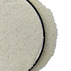 Homankit sprinkles close-up shows tiny white pearls ideal for cookies and cupcakes.
