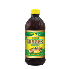Home Choice Jamaican Ginger Extract bottle pour for bold, natural flavor in drinks