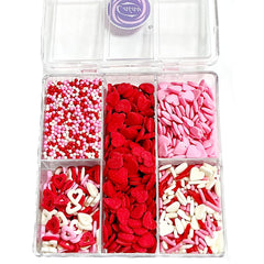 Homipooty heart shapes, jimmy shapes, and tiny pearls for cupcakes.