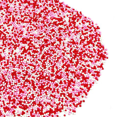 Homipooty Valentine sprinkles closeup shows vibrant packaging and pearl finish.