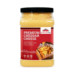 Hoosier Hill Farm Premium Cheddar Cheese Powder in a jar ready to sprinkle for flavor