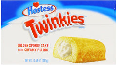 Hostess Twinkies cream-filled cake texture closeup, soft sponge with creamy center.