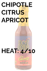 Hot Ones Los Calientes label close-up emphasizing all-natural ingredients and pepper variety