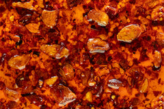 Hot Crispy Oil bottle ingredients label close-up shows key components for transparent flavor.