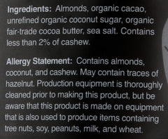 Hu Kitchen Chocolate Covered Almonds glossy shell close-up invites grab-and-go snacking