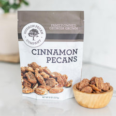 Hudson Pecan Cinnamon Candied Pecans close-up with glossy glaze for snacking