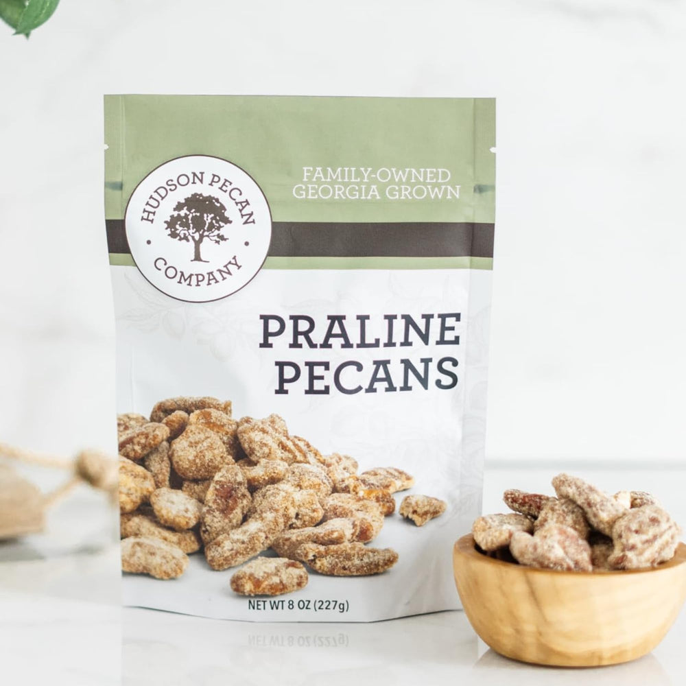 Hudson Pecan Company praline pecans in a resealable Georgia bag for fresh snacking.