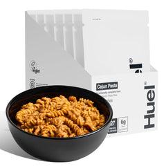 Huel Cajun Pasta pack front view showing a ready-to-heat meal.