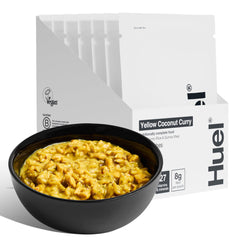 Huel hot and savory yellow coconut curry pack, ready in minutes