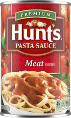 Plate of spaghetti topped with Hunt's Meat Pasta Sauce