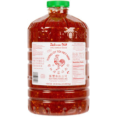Huy Fong chili garlic sauce bottle pour adds bold garlic heat for stir-fries and dipping
