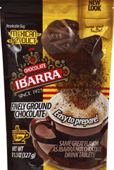 IBARRA Mexican chocolate powder in a cup, rich cocoa flavor for cozy mornings.