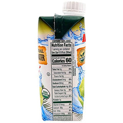 Iberia coconut water being poured into a glass for refreshment.