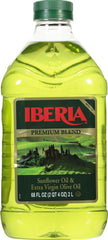 Iberia Premium Blend bottle pouring oil for versatile cooking.