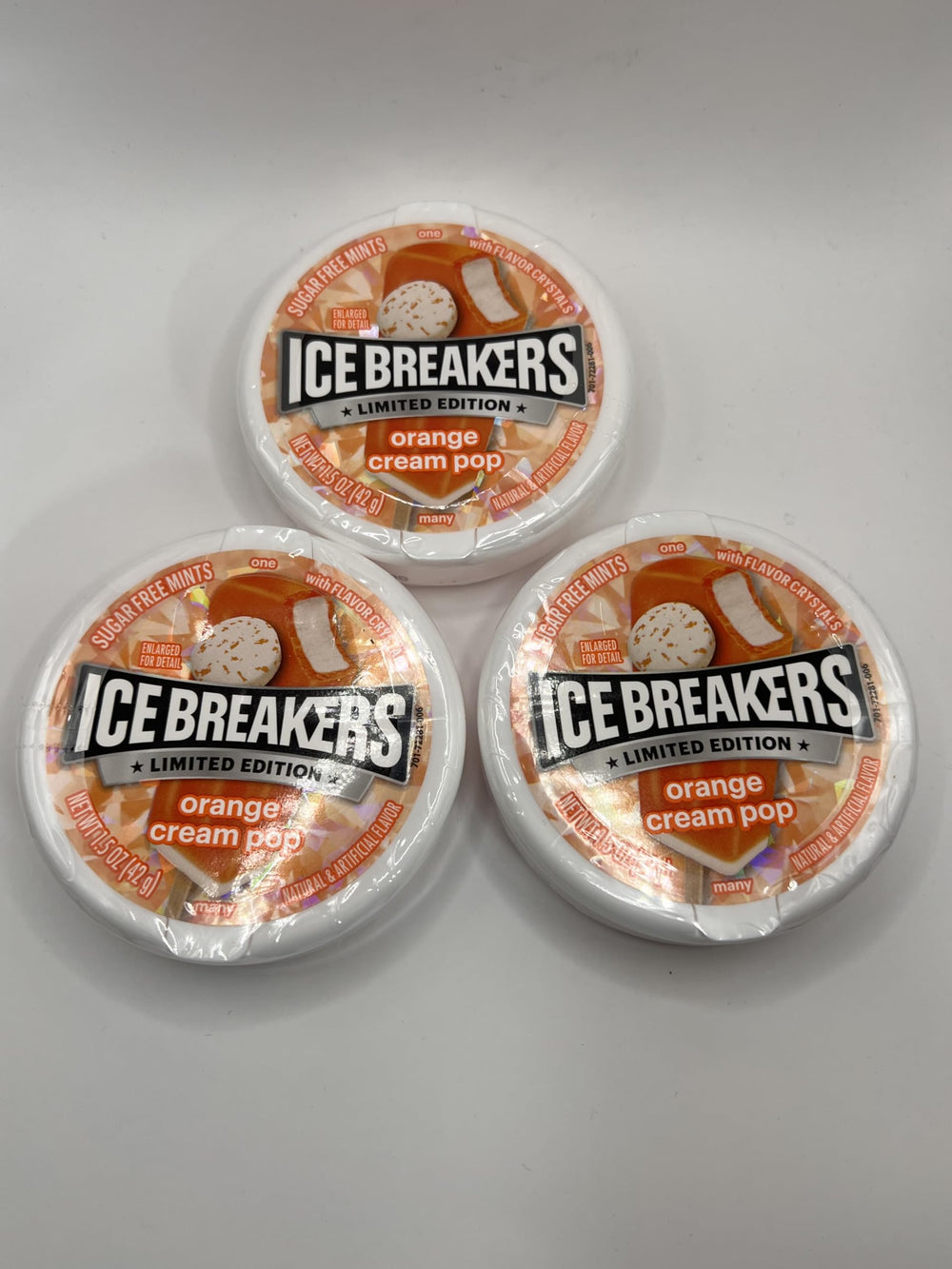 Ice Breakers Orange Cream Pop Mints 3-pack front view; portable breath freshening on the go