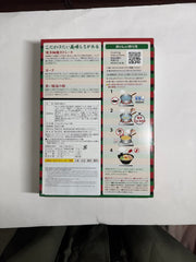Ichiran special red powder secret close-up, showing a flavor boost-ready element for ramen.