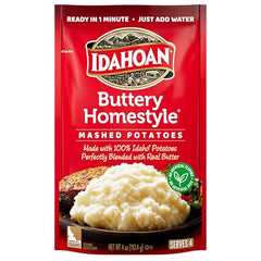 Idahoan Buttery Homestyle Mashed Potatoes shown with milk and butter for creaminess.