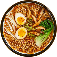 Steam rises as Immi Ramen Spicy Beef broth simmers with noodles.