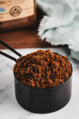 India Tree Dark Muscovado Sugar granules highlight rich color for deep baked goods.