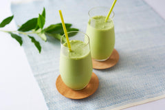 Close-up of vibrant green matcha powder from Ito En highlighting premium quality.