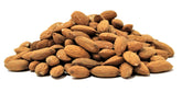Its Delish almonds shelled raw close-up for snacking and baking