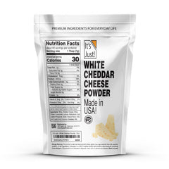 It's Just! cheddar powder spoon over popcorn for savory snacking