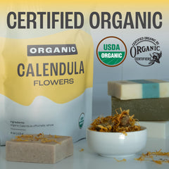 J Mac Botanicals calendula tea steeping in cup for a gentle infusion.