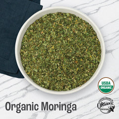 J Mac Botanicals moringa tea cup showing vibrant aroma and flavor