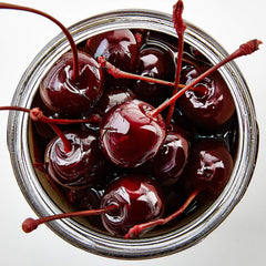 Jack Rudy Cherries used as cocktail garnish in a classic Old Fashioned